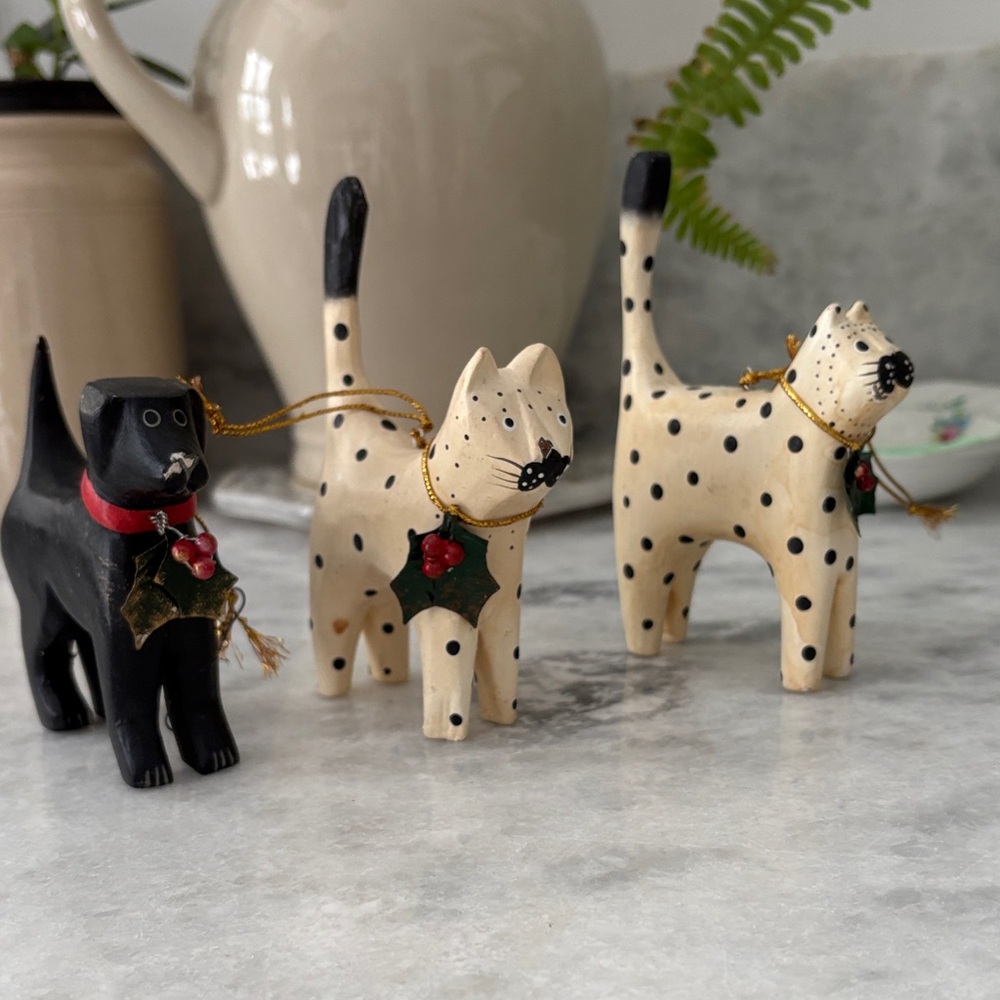Christmas ornaments to keep out all year round. Two cats and a dog.